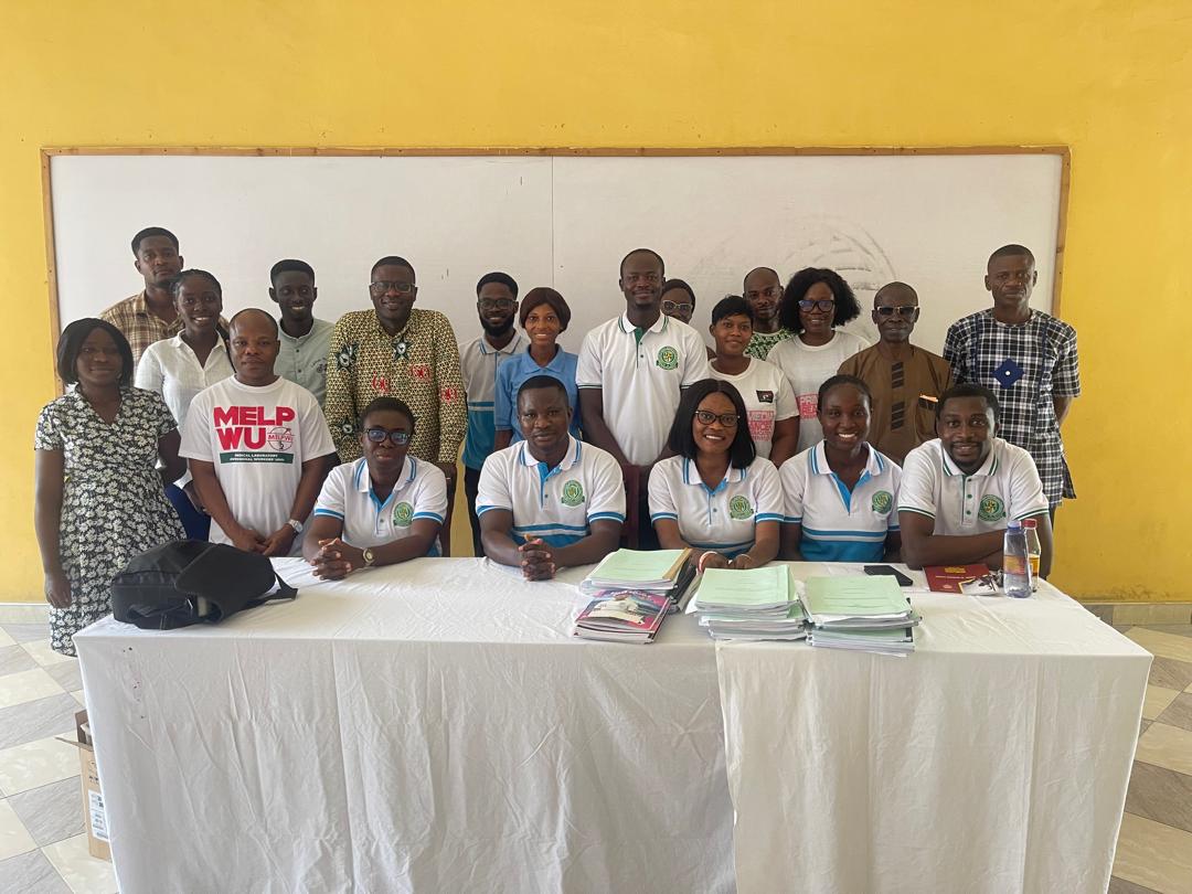 Flosam staff and students in a workshop